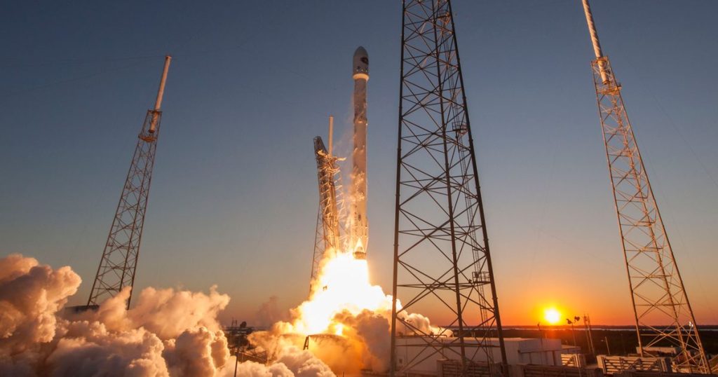 A rocket launching into the sky at sundown